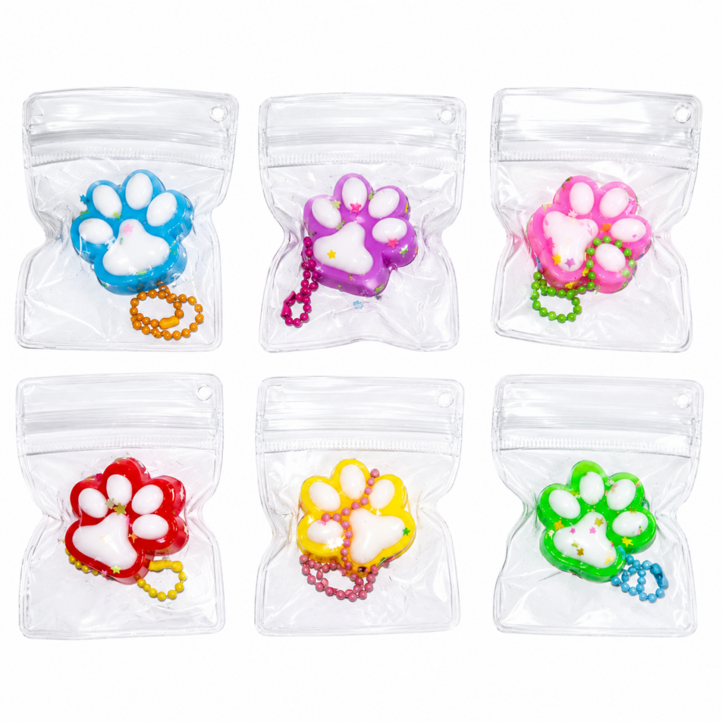 Pink paw print shaped silicone keyring charm