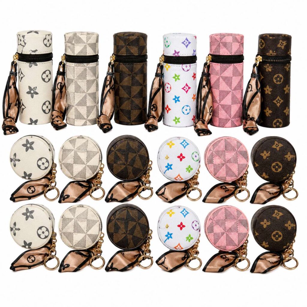Wholesale Mini Coin Purse Keyrings – 24 in a pack - Bags & Accessories | The Box Shop UK